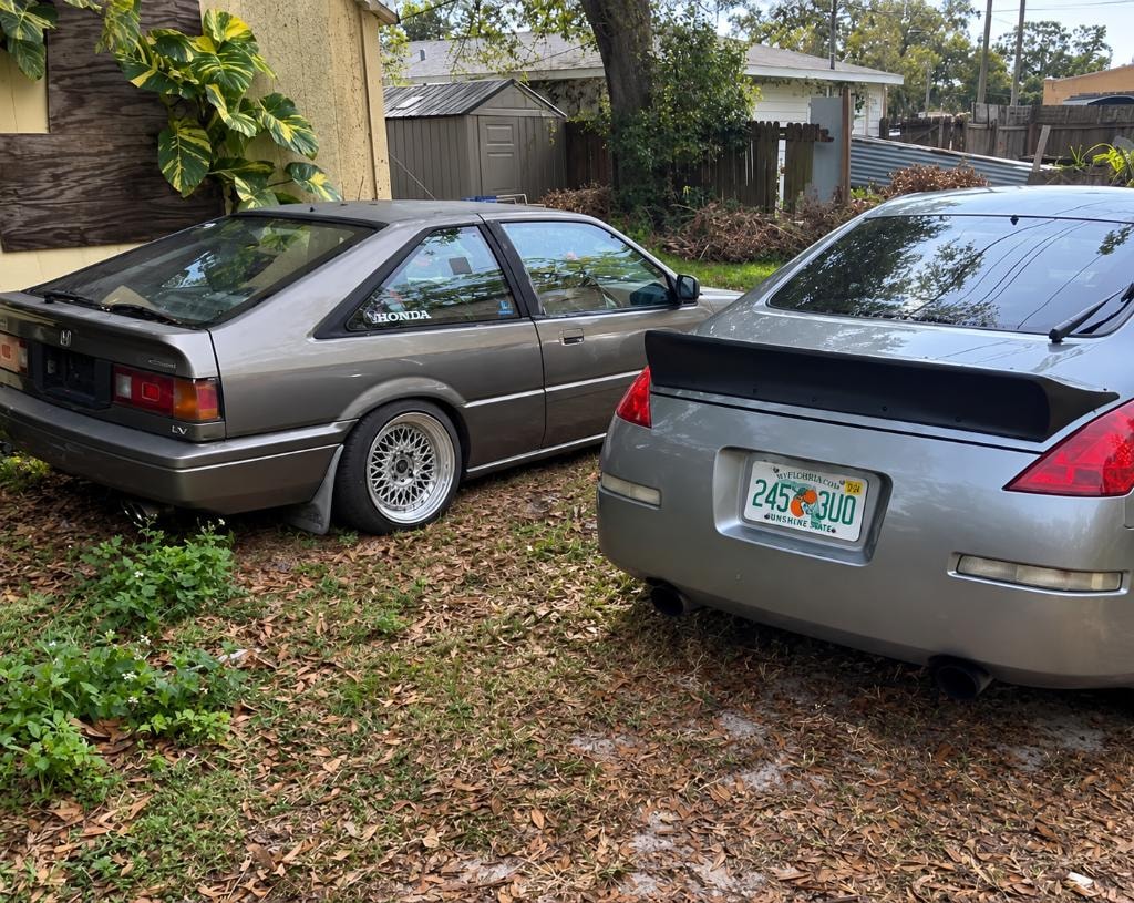 Two Honda cars driveway